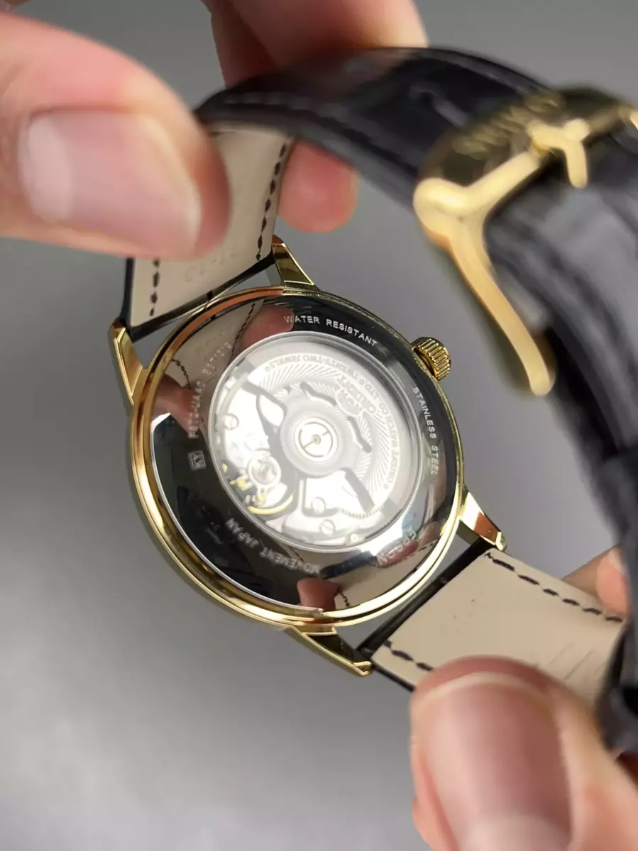 ساعت مچی اورینت اوپن هارت بند چرمی مشکی قاب طلایی Orient