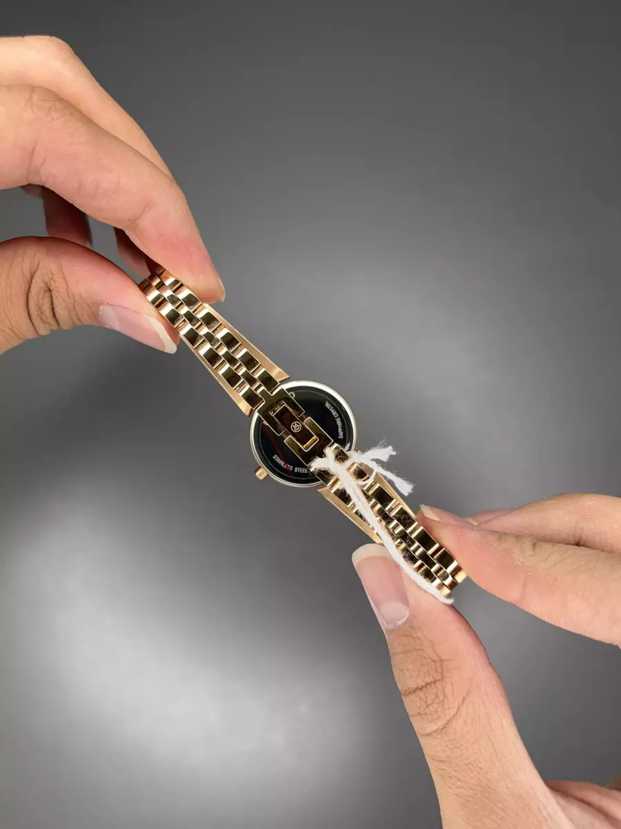 ساعت مچی موادو بند النگویی رزگلد صفحه صدفی Movado