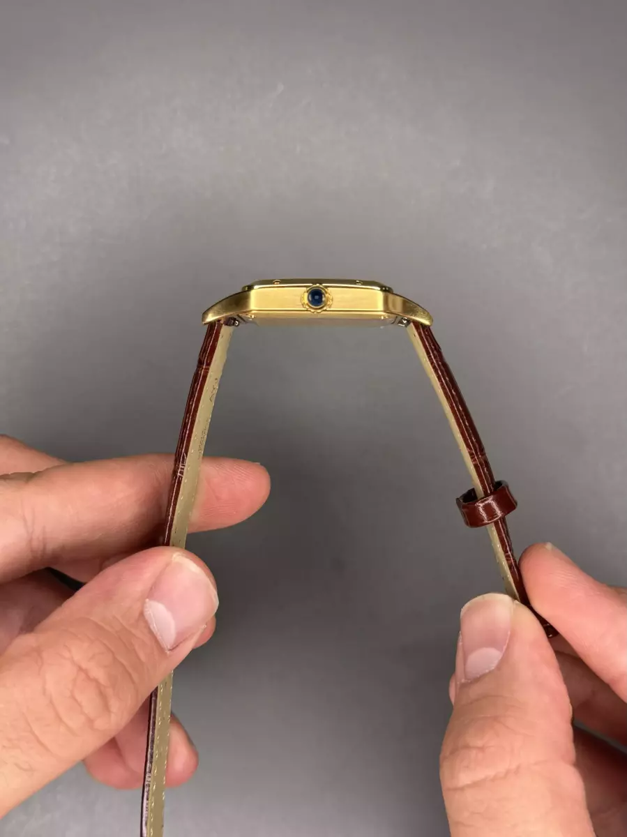 ساعت مچی کارتیه دومونت بند چرمی قهوه ای قاب طلایی Cartier