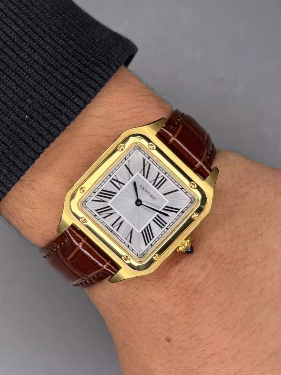 ساعت مچی کارتیه دومونت بند چرمی قهوه ای قاب طلایی Cartier