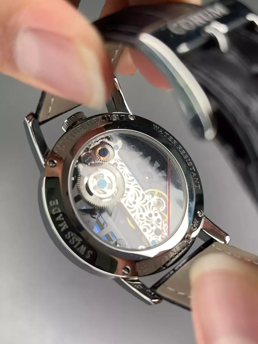 ساعت مچی کروم صفحه اسکلتون بند چرمی مشکی Corum