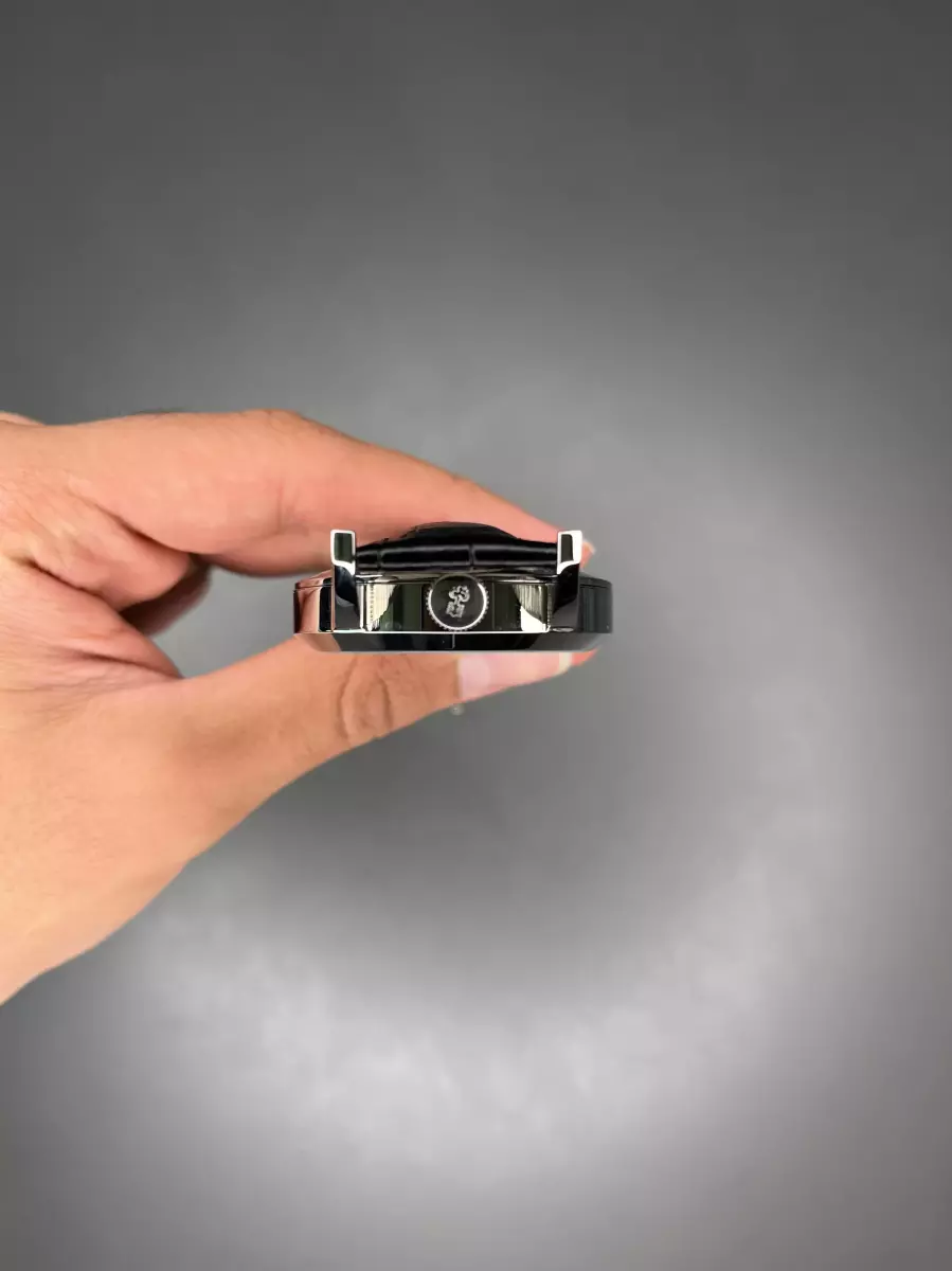 ساعت مچی کروم صفحه اسکلتون بند چرمی مشکی Corum