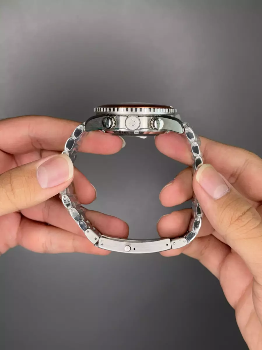 ساعت مچی امگا سیمستر کورنوگراف صفحه مشکی بزل نارنجی Omega Seamaster