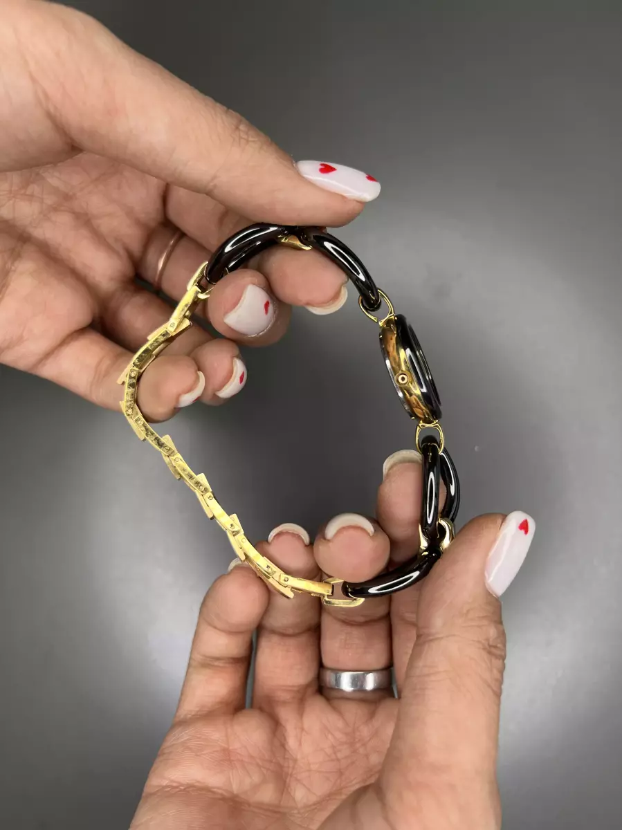 ساعت مچی گوچی صفحه مشکی بند طرحدار Gucci