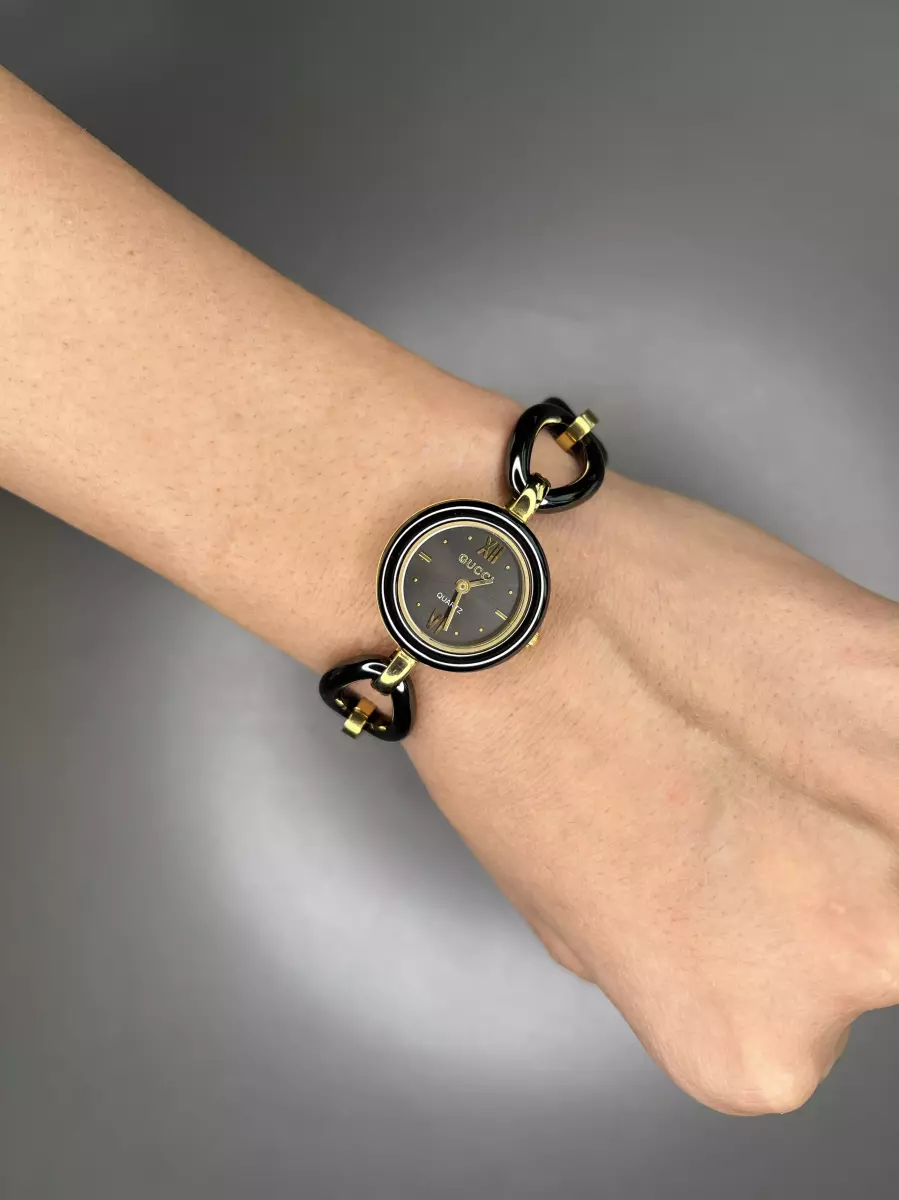 ساعت مچی گوچی صفحه مشکی بند طرحدار Gucci