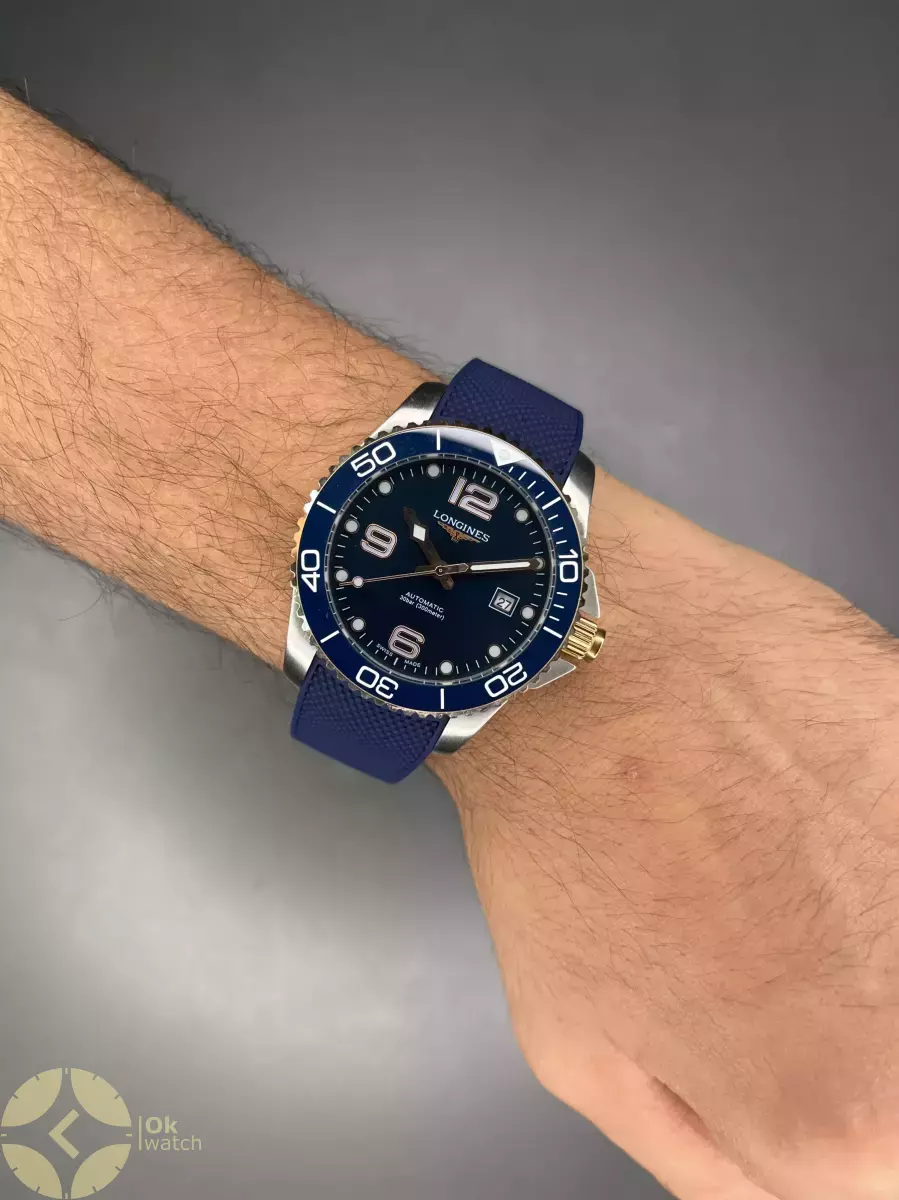 ساعت مچی لونژین اتوماتیک بند رابر آبی بزل طلایی Longines