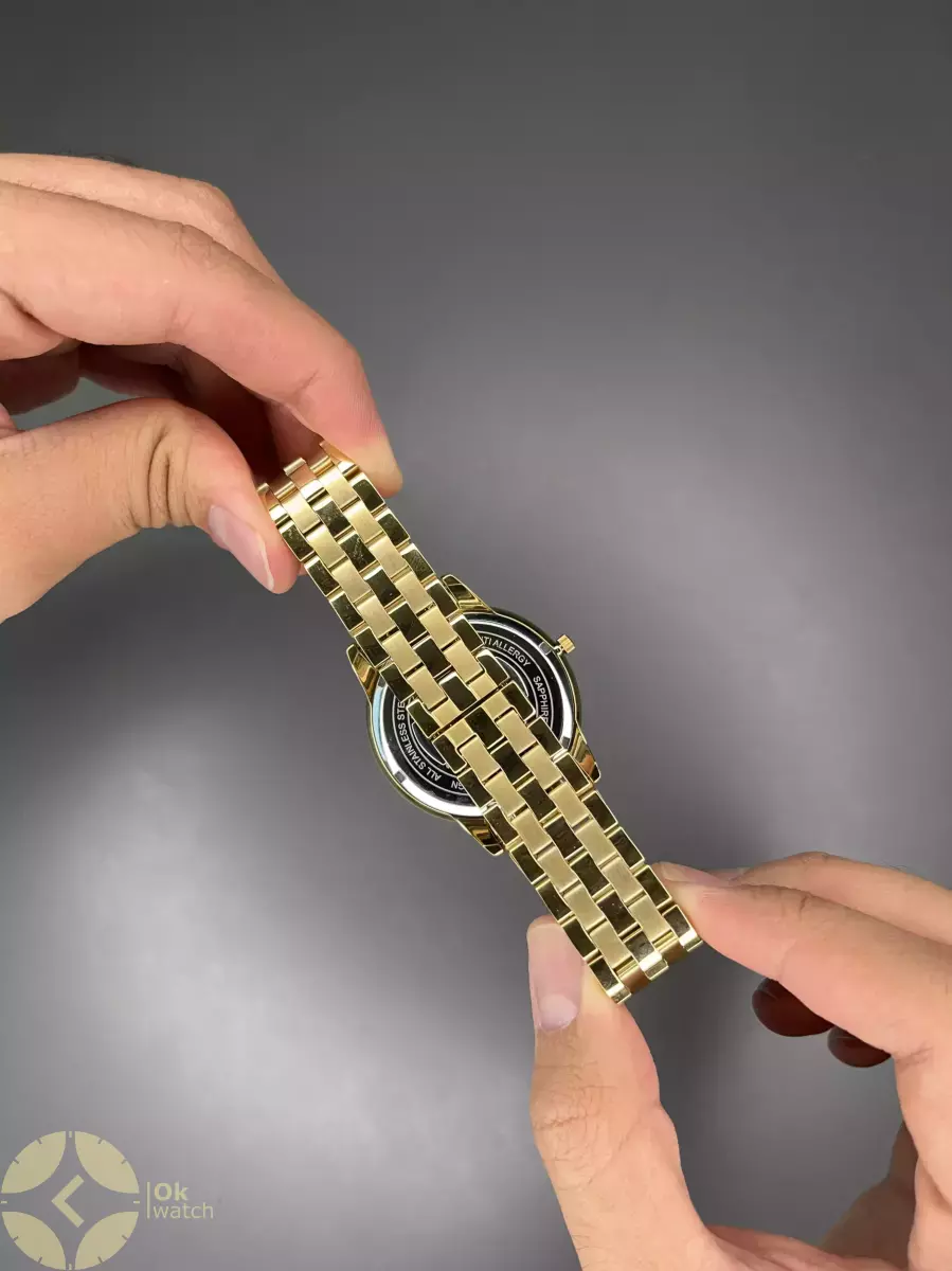 ساعت مچی رومانسون کوارتز بند طلایی صفحه مشکی Romanson Quartz