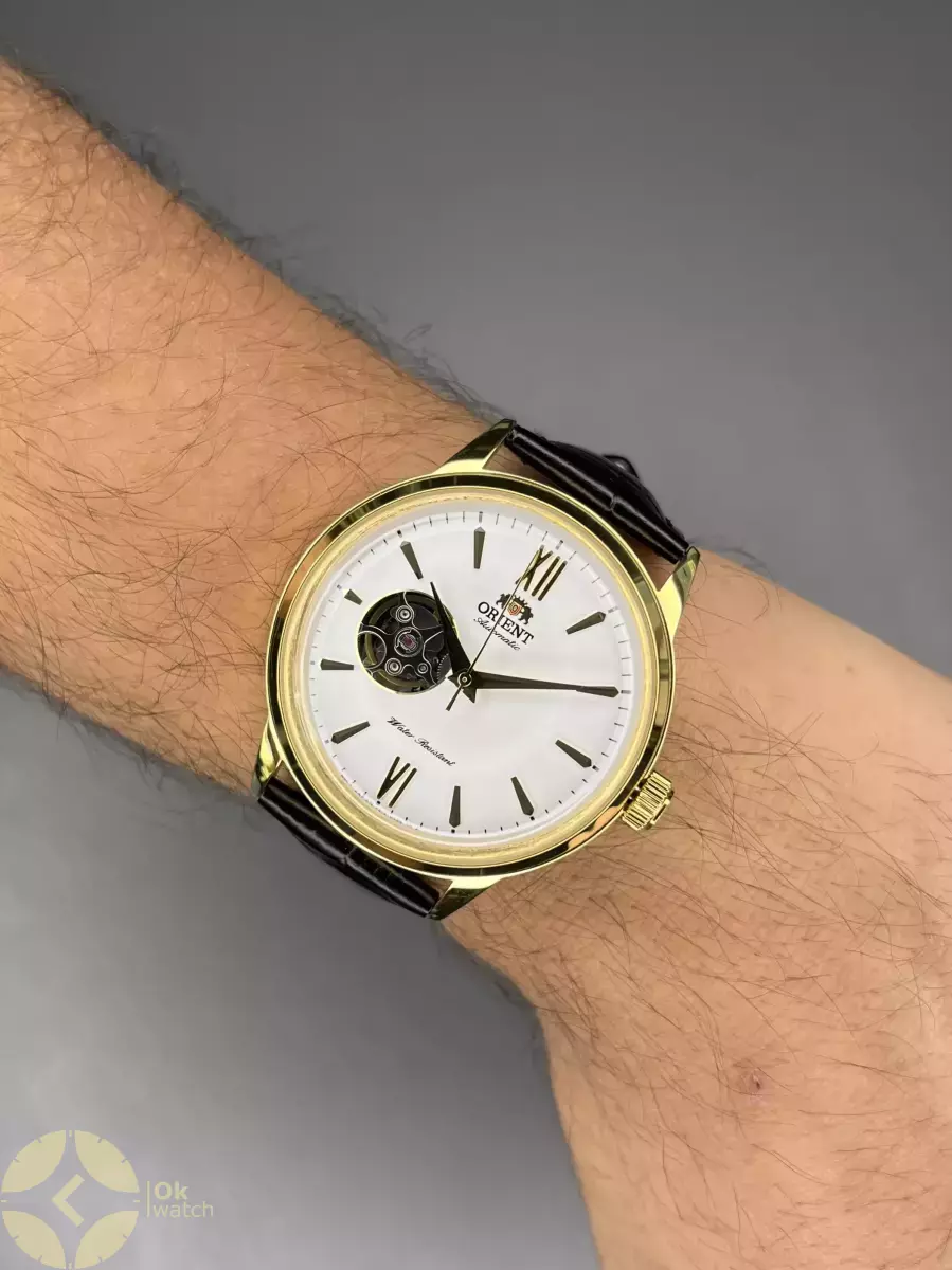 ساعت مچی اورینت اوپن هارت بند چرمی مشکی قاب طلایی Orient