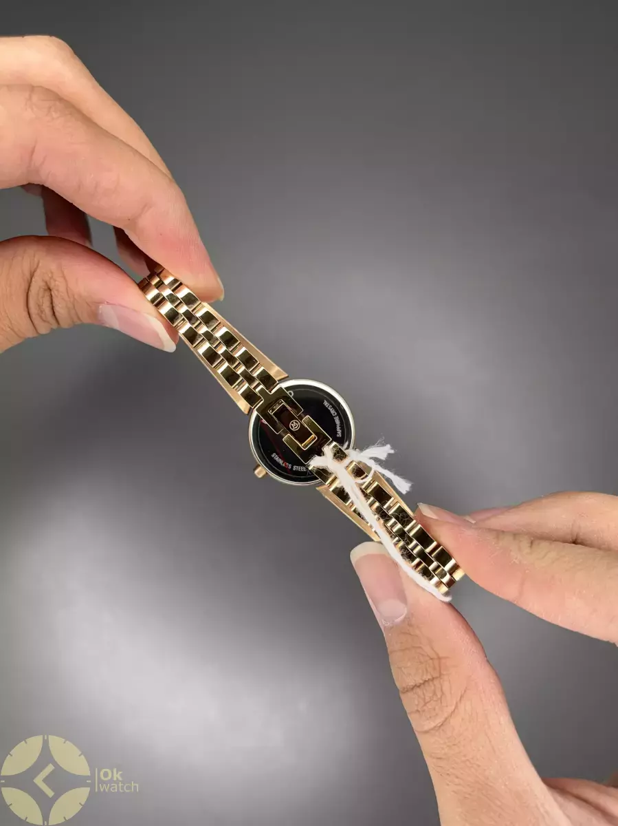 ساعت مچی موادو بند النگویی رزگلد صفحه صدفی Movado