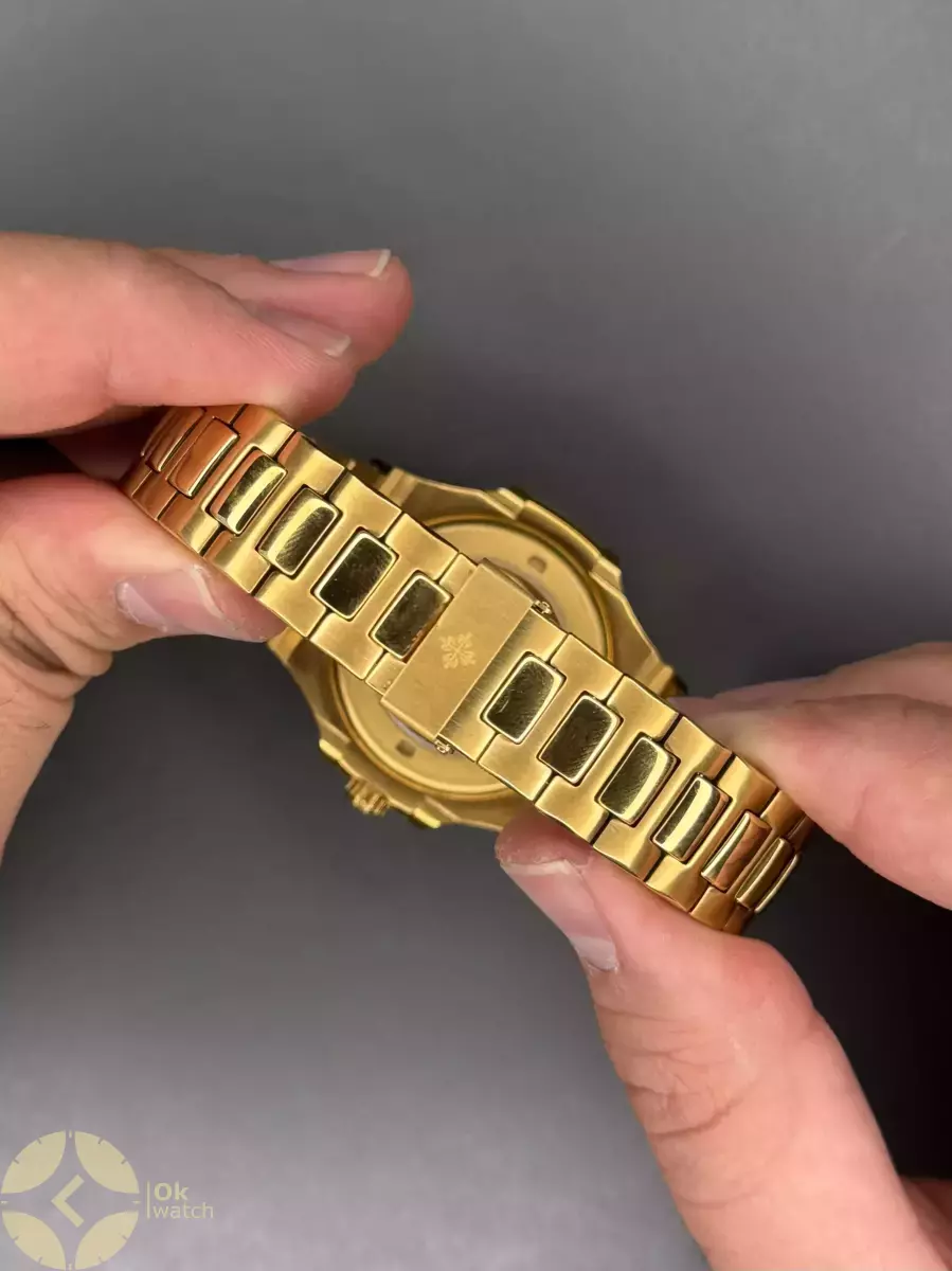 ساعت مچی پتک فیلیپ بند طلایی موتور اتوماتیک صفحه سفید Patek Philippe Nautilus