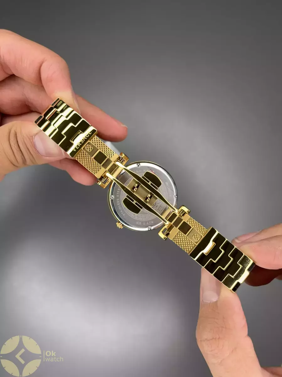 ساعت مچی ورساچه بند حصیری طلایی صفحه نارنجی Versace