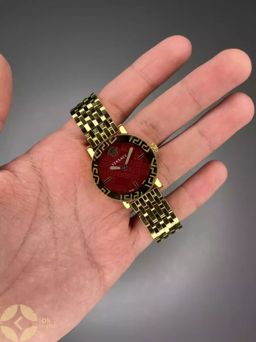 ساعت مچی ورساچه دورحکاکی بند طلایی صفحه قرمز Versace