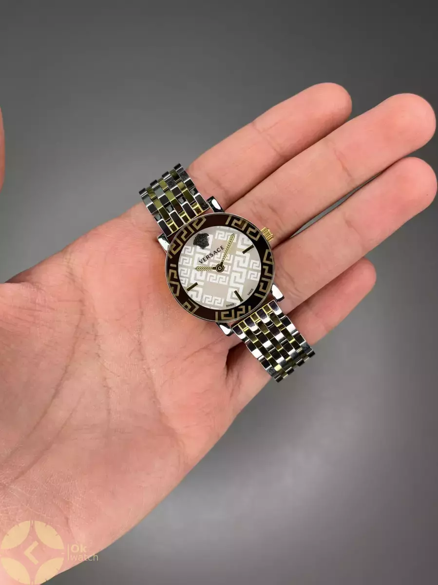 ساعت مچی ورساچه دورحکاکی بند طلایی سیلور صفحه سفید Versace