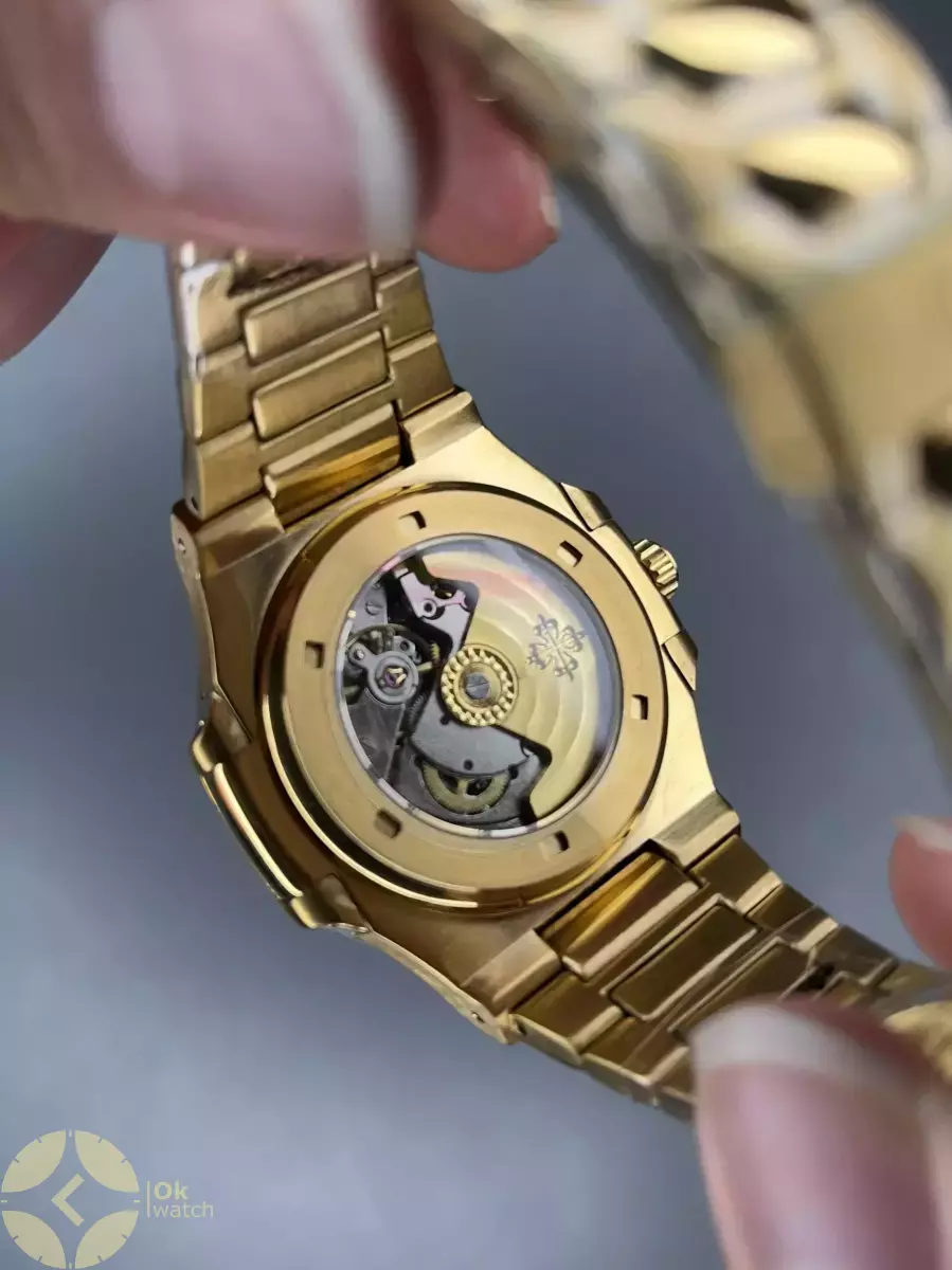 ساعت مچی پتک فیلیپ اتوماتیک بند طلایی صفحه مشکی Patek Philippe Nautilus