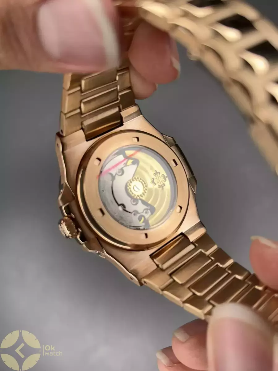 ساعت مچی پتک فیلیپ اتوماتیک بند فلزی رزگلد صفحه سفید Patek Philippe Nautilus