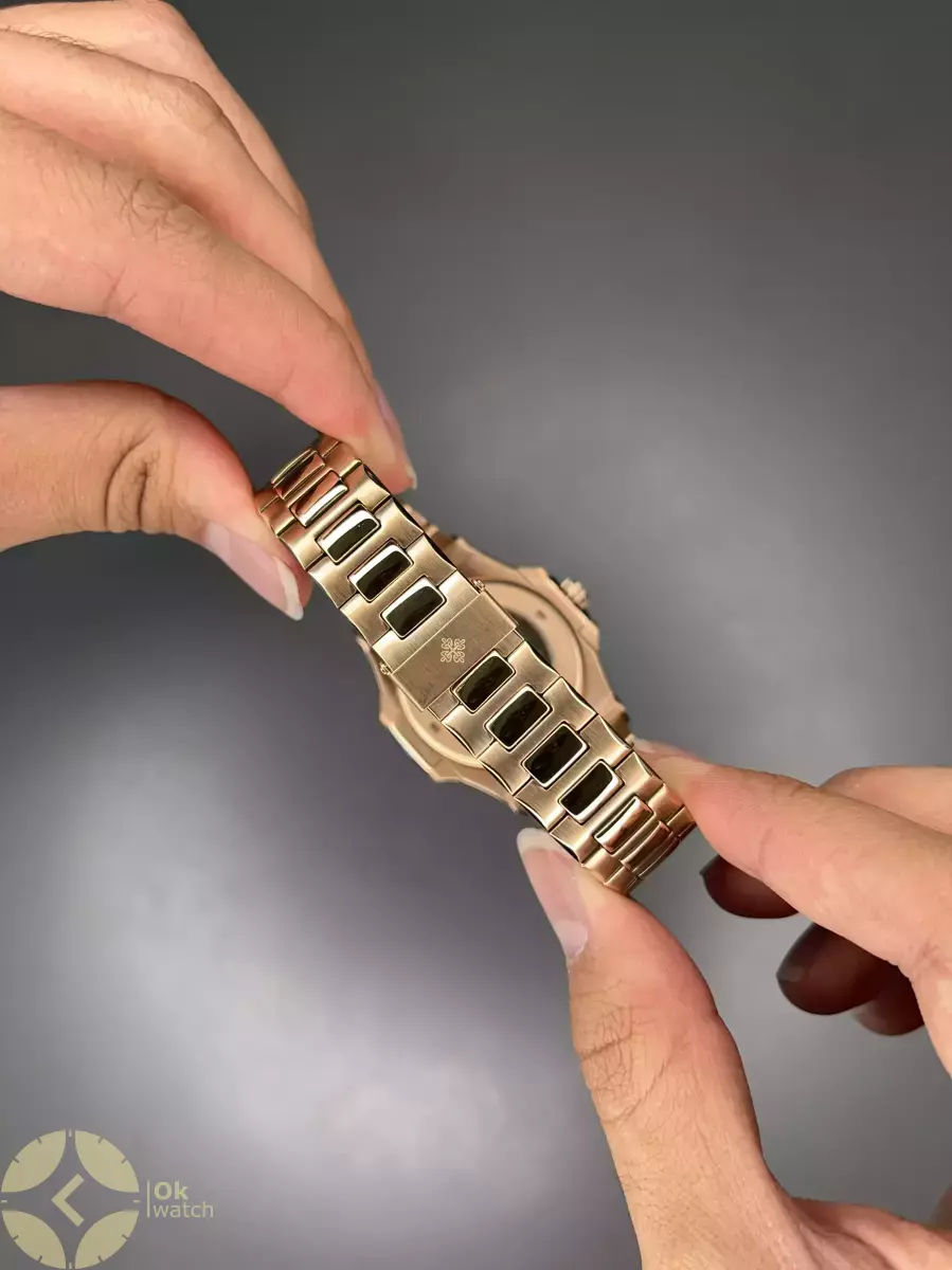 ساعت مچی پتک فیلیپ اتوماتیک بند فلزی رزگلد صفحه سفید Patek Philippe Nautilus