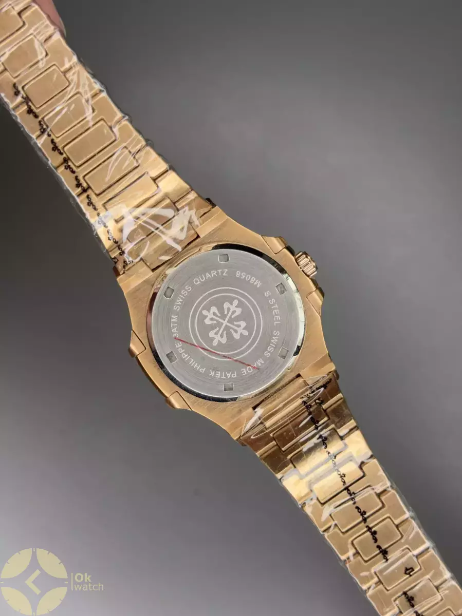 ساعت مچی پتک فیلیپ ناتیلوس صفحه سفید بند رزگلد Patek Philippe Nautilus