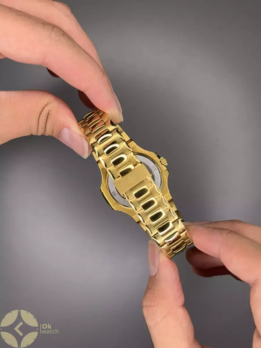 ساعت مچی پتک فیلیپ ناتیلوس بند طلایی صفحه مشکی Patek Philippe Nautilus