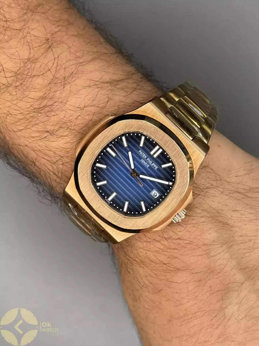 ساعت مچی پتک فیلیپ اتوماتیک بند فلزی رزگلد صفحه سرمه ای Patek Philippe Nautilus