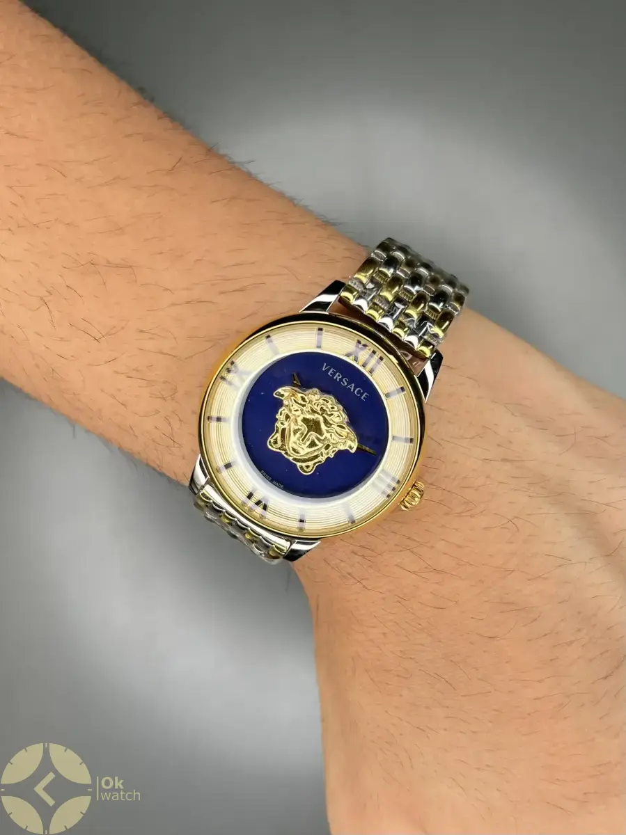 ساعت مچی ورساچه طرحدار بند سیلورطلایی صفحه آبی Versace